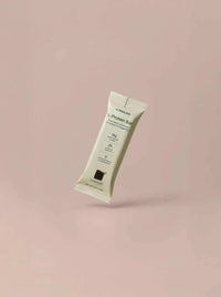 L-Protein Bar single vegan protein bar on beige background with 14g protein and longevity science benefits